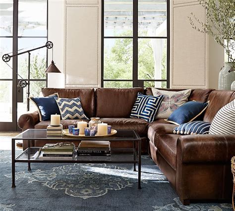 Pair a round rug with your sectional couch or a square rug underneath your bed. Bryson Persian-Style Rug | Pottery Barn | Brown living ...