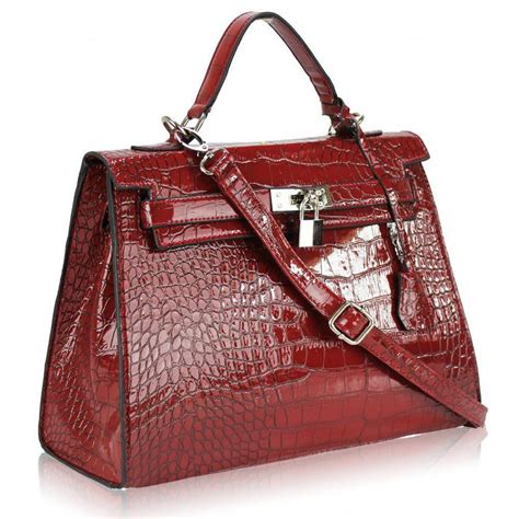 Ladies Handbags For Some Women Getting A Genuine Designer Bag Is Not