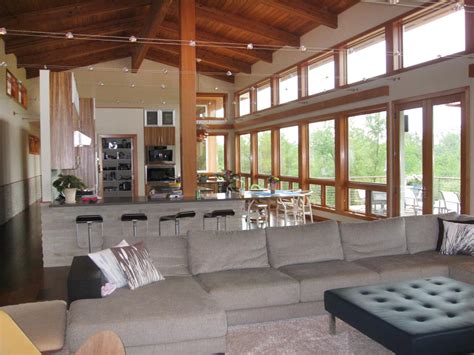 Adding vaulted or volume ceilings in a home instantly creates spaciousness. Open Concept Living Room With Vaulted Wood Ceiling | HGTV