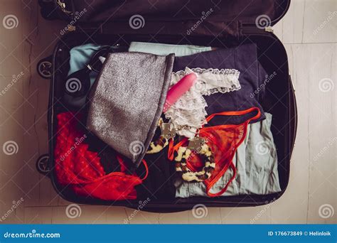 Traveling With Sex Toys Concept Packing Sex Toys In Luggage Suitcase