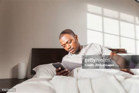 Black Man Sleeping In Bed Photos And Premium High Res Pictures Getty