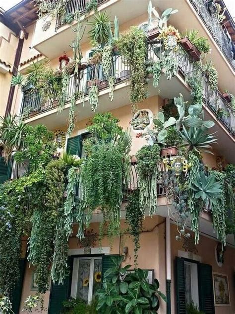 Succulents are a great option for vertical gardens. DIY Ideas for Creating a Small Urban Balcony Garden | Arts and Classy