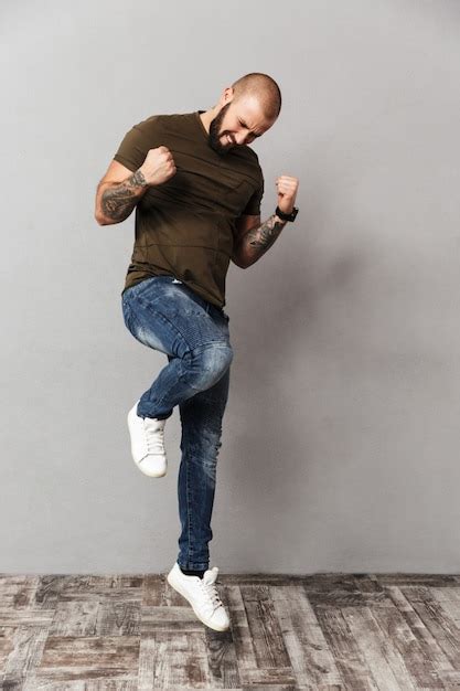Premium Photo Full Length Image Of Muscular Happy Man With Beard And