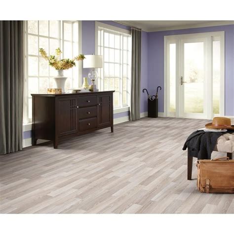 Diy and spent less than $2,800. TrafficMASTER Oak Strip Washed Grey Residential Vinyl Sheet, Sold by 12 ft. Wide x Custom Length ...