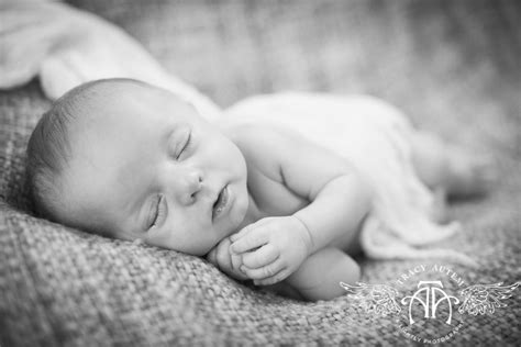 Baby Camden Newborn Portraits In Home With Mom And Dad