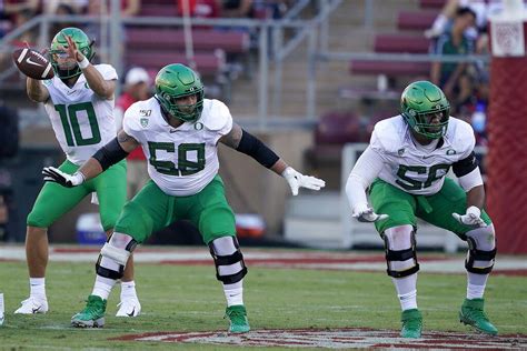 Find penei sewell stock photos in hd and millions of other editorial images in the shutterstock collection. Oregon Ducks' Penei Sewell, Shane Lemieux, Jake Breeland ...