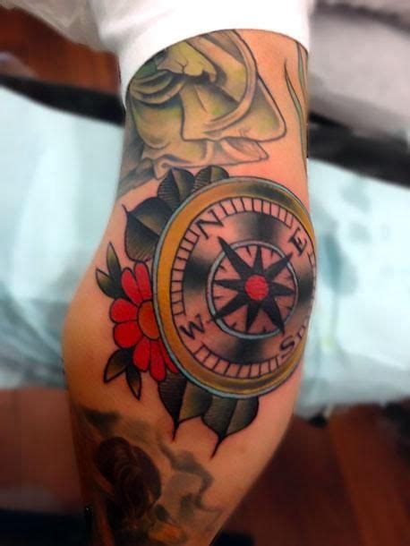 An Awesome Tattoo Of A Compass Inked On The Mans Elbow Rose Tattoos