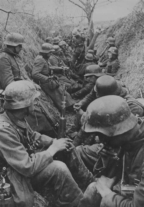 German Soldiers Resting In A Trench Somewhere On The Eastern Front