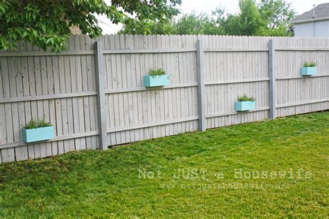 The humble garden fence, our gardens have them but we neglect them.yes we may paint or stain them but do we decorate? Ideas for Outdoor Decorating - Stacy Risenmay