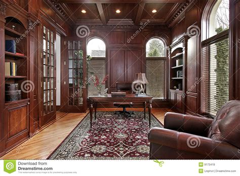 This arrangement creates a more casual vibe. Library With Cherry Wood Paneling Stock Photo - Image of ...