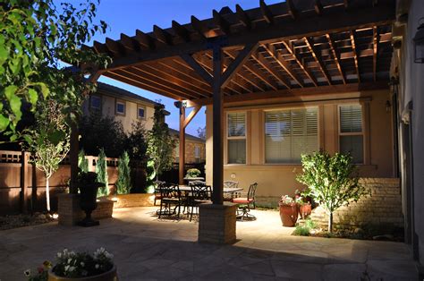 Check out these beautiful tuscan kitchen ideas which will bring the style of your home to a whol new level! Tuscan Patio and Arbor with Stone Pillars and Lighting in ...
