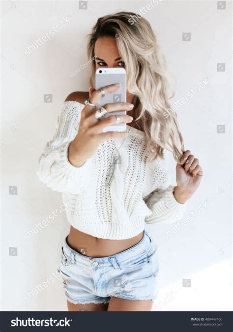 Hot Girl Taking Her Clothes Photos And Images Shutterstock