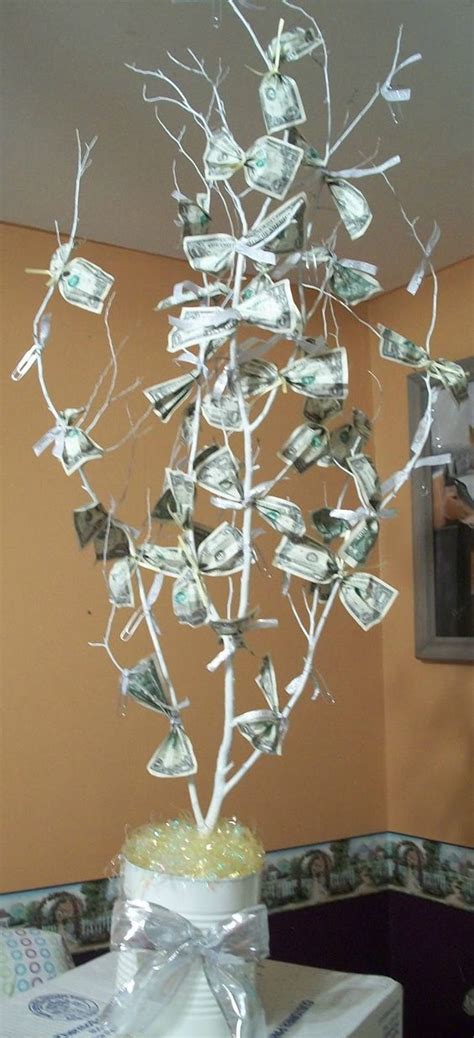 Prepare wedding cake from money as a wedding gift. A money tree is a great gift idea for a wedding, baby ...