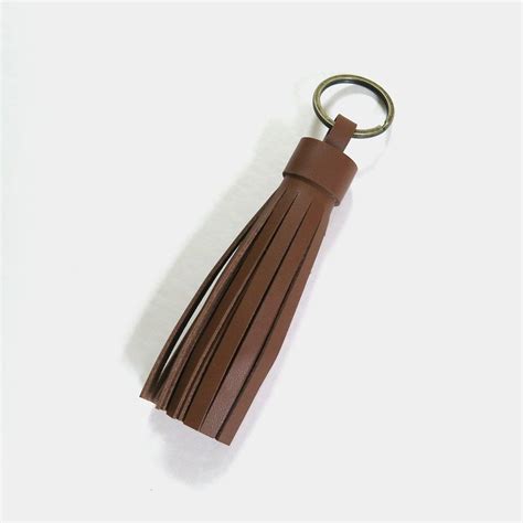 Leather Tassel Keychain - Caramel | Leather tassel keychain, Tassel keychain, Leather tassel