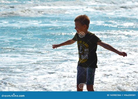 A Boy By The Sea Happy Little Boy On The Ocean Stock Photo Image Of