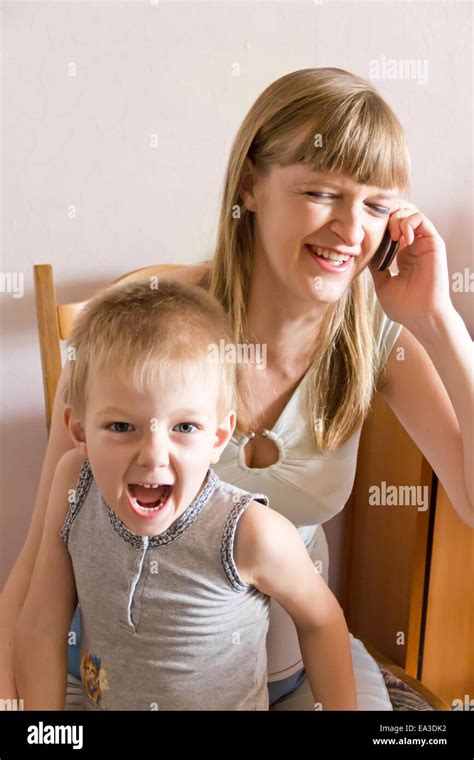 Talking Mother And Angry Son Stock Photo Alamy