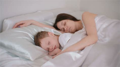 Mom And Son Sleeping Together Mom Hugging Her Son Stock Footage