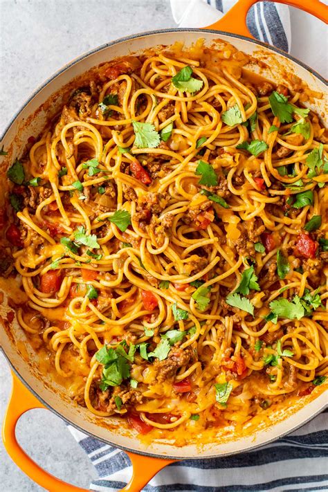 Right before serving, sprinkle crushed tortilla chips over the pasta bake. Mexican Spaghetti Casserole (Easy Taco Spaghetti ...