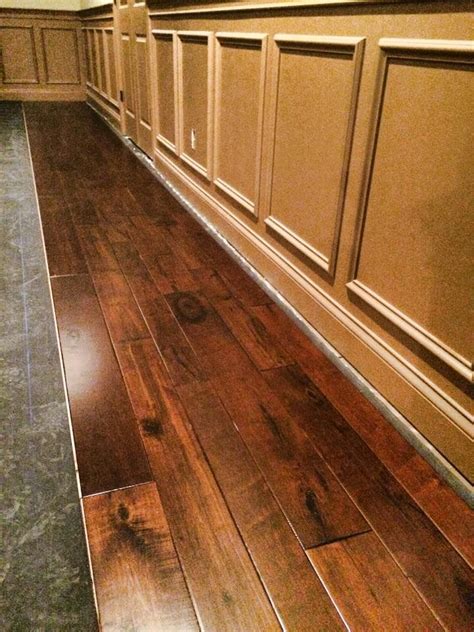 Check spelling or type a new query. Varying width flooring going down against brown trim in ...