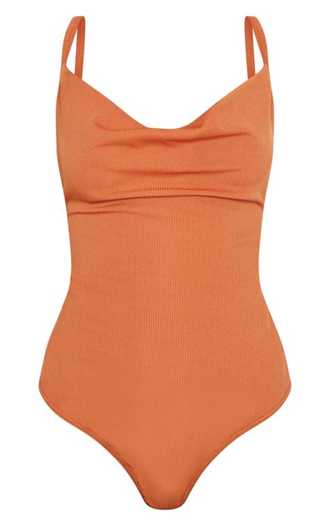 Burnt Orange Rib Cowl Neck Bodysuit Tops Prettylittlething