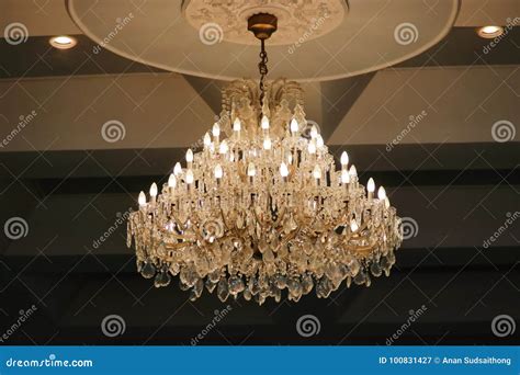 Luxury Crystal Chandelier Hanging Under Ceiling In The Room Stock