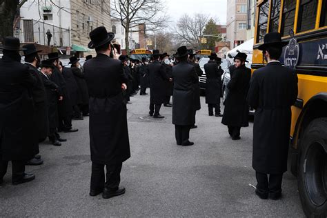 White flowers of various kinds are common for funeral services. Packed Jewish Funeral Ends in Scandal, Apology: NYC