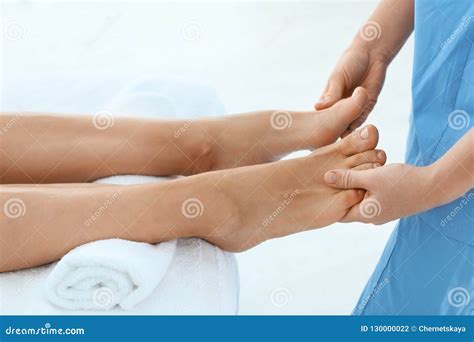 Woman Receiving Leg Massage In Wellness Center Stock Photo Image Of