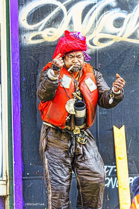 Man With Fist Up In The Tenderloin District San Francisco By Mitchell Funk