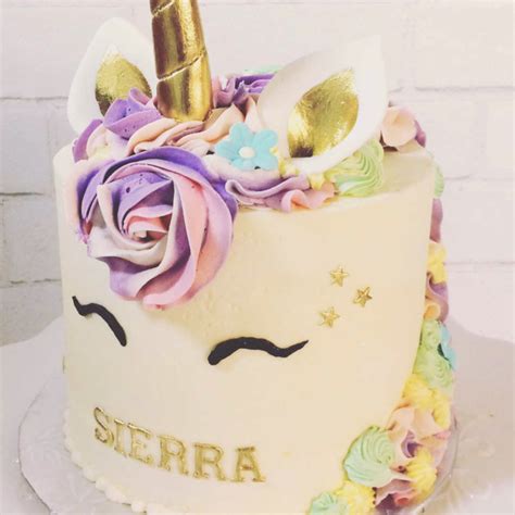 Cut into these pretty rainbow unicorn cake to discover swirls of rainbow colored cake hiding inside. Unicorn Cake - Sweet Revenge Bake Shop