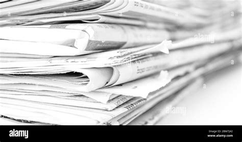 Stack Of Newspapers Isolated On White Background Stock Photo Alamy