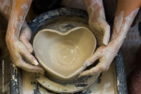 Pottery Making Smeared In Clay Hands Of Man And Woman On Potters