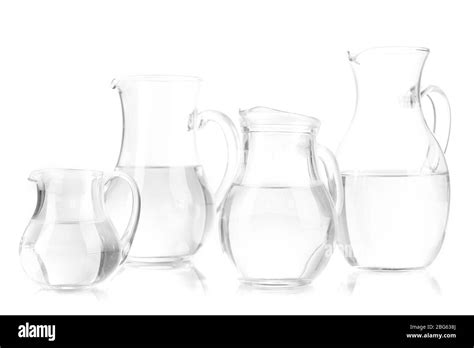 Glass Pitchers Of Water Isolated On White Stock Photo Alamy