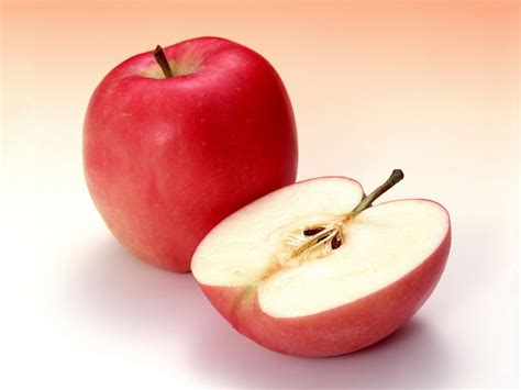 Red Apple Fruit Hd Wallpaper One And A Half Apples 1600x1135