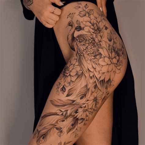 Get This Beautiful And Sensual Peacock Tattoo Design With Flowers Know