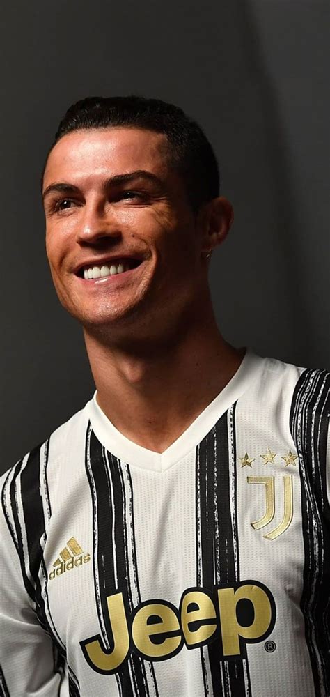 a man is smiling and wearing a jersey with the word jeep on it s chest
