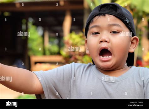 Portrait Of Funny Yawning Boy Asiathailand Children Selective Focus