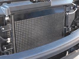 The warm air might be the result of a clogged a/c condenser coil or disabled cooling fan. TDR 75: Your Story: One Year Follow Up - page 2