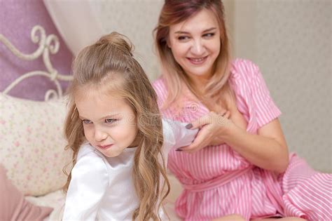 Loving Mother Consoling Her Sad And Sulky Daughter Stock Photo Image