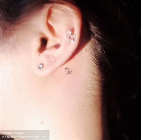 31 best capricorn sign tattoos behind ear images capricorn sign. Capricorn Zodiac symbol tattoo behind the left ear ...
