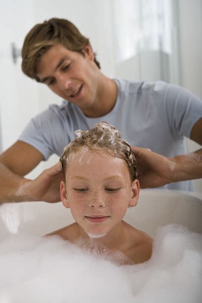 Father Washing Son In Bathtub Free Photo Download Freeimages
