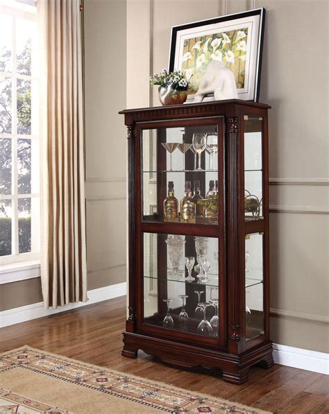 Constructed of solid wood, it boasts a warm brown finish. Carrie Curio Cabinet w/ 4 Side Doors in Cherry - Acme ...