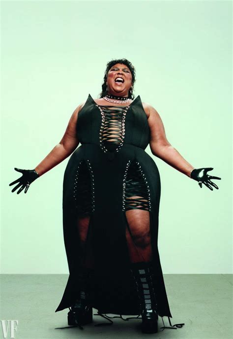 Lizzo Went Full Goth Glam With A Lace Up Dress And Mullet Haircut