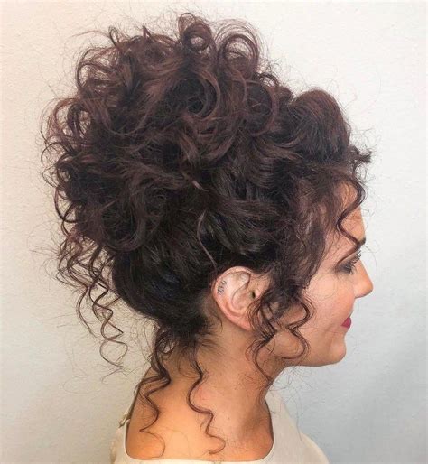 voluminous high curly bun updo updos curly hair styles naturally curly wedding hair curly