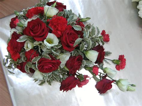 Red Roses Red Carnations White Lisianthus And Pittosporum Red