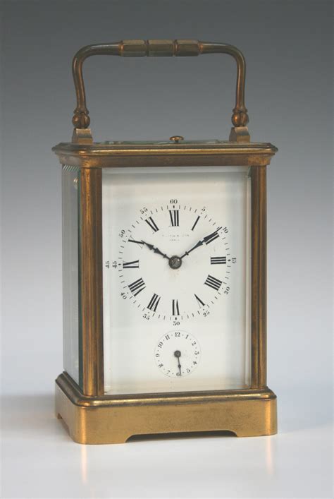A Late 19thearly 20th Century French Lacquered Brass Carriage Alarm