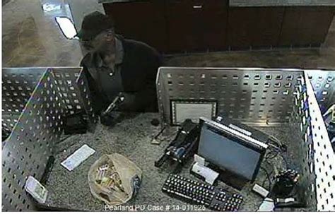 Armed Robber Jumps Over Bank Tellers Counter In Pearland On The Run