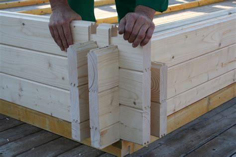 How to cut logs for a log cabin. Easy to construct cabins made from interlocking parts ...