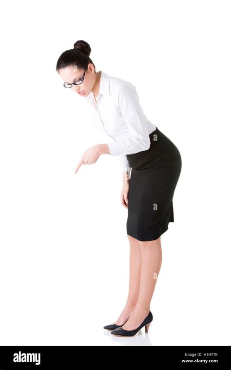 Young Business Woman Bending Down And Looking Stock Photo Alamy