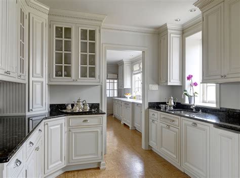 A beautiful upgrade, learn how to ad trim to kitchen cabinet tops. Kitchen Crown Molding Design Ideas