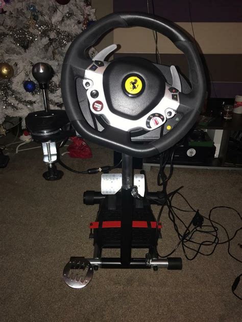 Xbox One With Steering Wheel Pedals Gear Shifter And A Stand For It To
